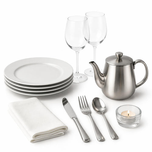 White dinner plates, wine glasses, cutlery, teapot, napkin and tealight for front of house
