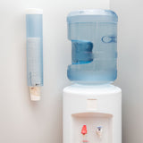 San Jamar C3165FBL 16" Frosted Blue Medium Water Cup Dispenser - 64-83mm